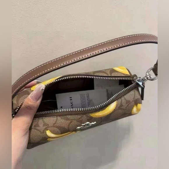 💰SALE💰 NWT Coach Nolita Barrel Bag in Signature Canvas with Banana Print - Picture 5 of 7